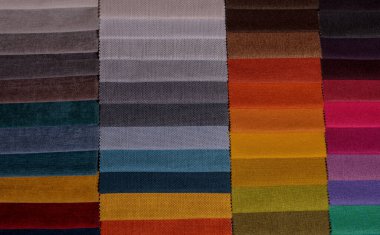 Mobilya kumaşı örnekleri. Çok renkli kumaş dokusu arka planı..