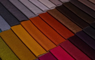 Mobilya kumaşı örnekleri. Çok renkli kumaş dokusu arka planı..