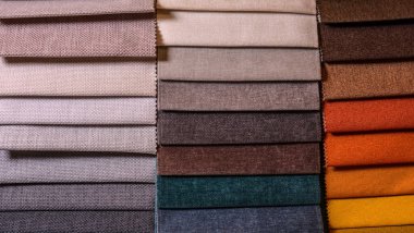 Mobilya kumaşı örnekleri. Çok renkli kumaş dokusu arka planı..