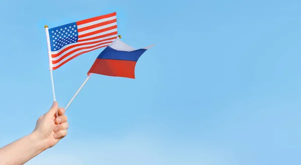 Flags Usa Russia Hand Man Blue Sky Copy Space Fot — Stock Photo, Image