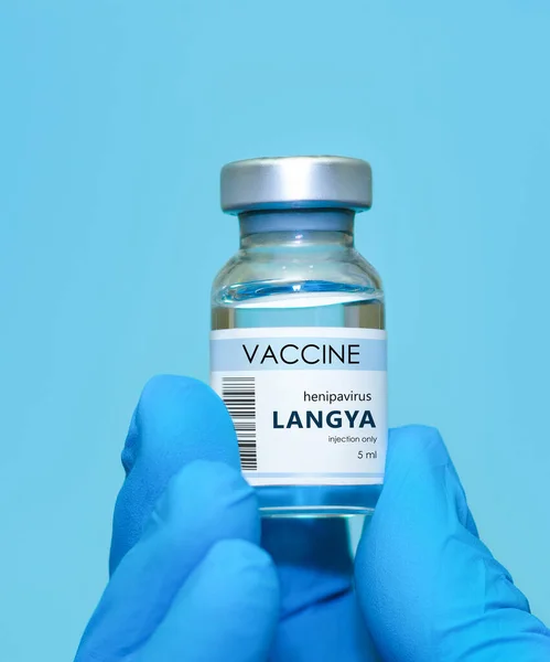 Doctor Hand Medical Glove Holds Bottle Vaccine Langya Henipavirus Layv — Stockfoto
