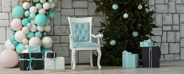 Christmas photo zone. Arch from a Christmas tree, balls, garlands, New Year\'s decorations. Gift boxes, empty blue chair