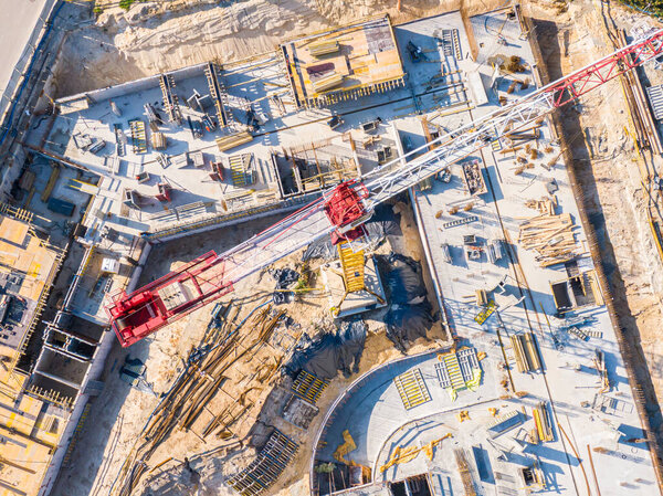 Construction of new apartment buildings in the city residential area. construction site with tower cranes. aerial view