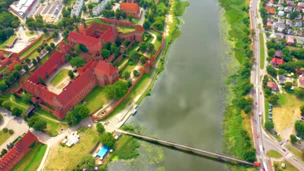 Malbork, Pomerania / Poland  Panoramic view of the medieval Teutonic Order Castle in Malbork, Poland - High Castle and St. Mary church — Stock Video