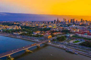Panorama of Old Town and downtown of Warsaw from drone perspective during sunset