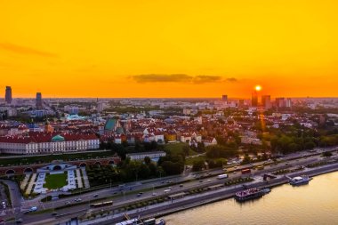 Panorama of Old Town and downtown of Warsaw from drone perspective during sunset