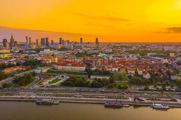 Panorama of Old Town and downtown of Warsaw from drone perspective during sunset