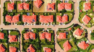 New development real estate. Aerial view of residential houses and driveways neighborhood during sunny day.Tightly packed homes.Top down view over private houses