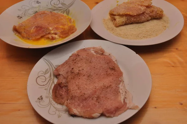 Traditional Polish pork chops in breadcrumbs and eggs. Delicious dinner dish