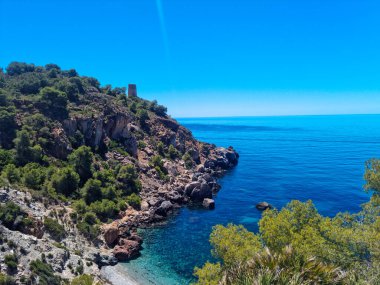 Aerial view of the cliffs of Maro, view of the Mediterranean