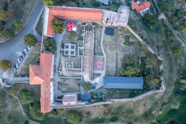 Aerial top down ground plan view of Pecsvarad medieval Romanesque fortified church turned castle in Hungary Baranya region