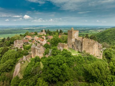 Aerial view of Brancion a hidden gem authentic medieval village in the heart of Southern Burgundy France with town gate, ruined Gothic medieval castle, living example of medieval military architecture