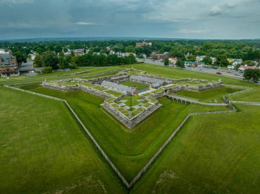 Aerial view of star shaped reconstructed Fort Stanwix in Rome New York with four angled wooden bastions and cannons