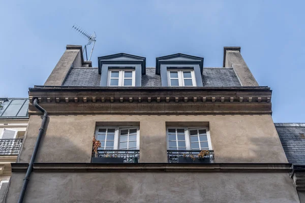 Mansard dormer windows on a classic Parisian house