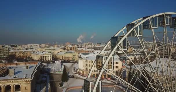 Kyiv Podil Ferris Wheel no inverno. Praça dos Contratos, Kiev, Ucrânia — Vídeo de Stock