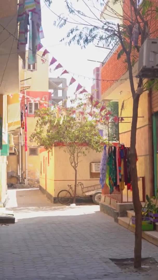 Narrow street with decorative flags in Hurghada city, Egypt — Video Stock