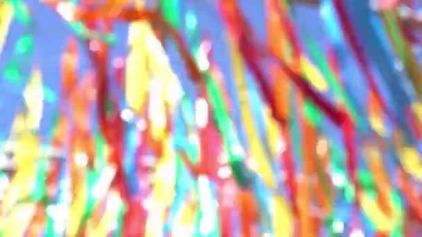 Defocused Decorative Multicolor Ribbons Waving Wind City Street Festival Background — Stock Video