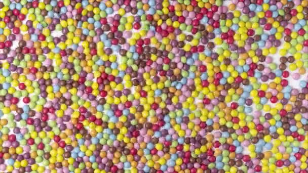 Multicolored Dragee Candies Make Text Candy Stop Motion Animation Flat — Vídeo de stock