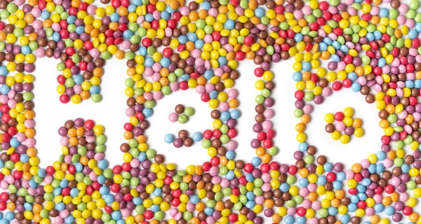Woord Hello Multi Gekleurde Ronde Snoepjes Witte Achtergronden — Stockfoto