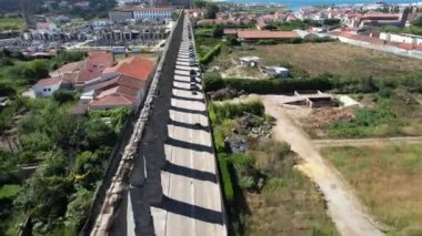 Drone Flight over the old historical city Vila do Conde with Santa Clara Aqueduct in the North of Portugal
