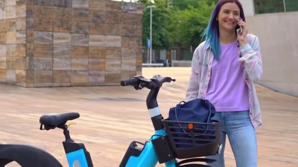 Happy Hipster Female Talking Phone Standing Electric Bicycle Urban Street — Video