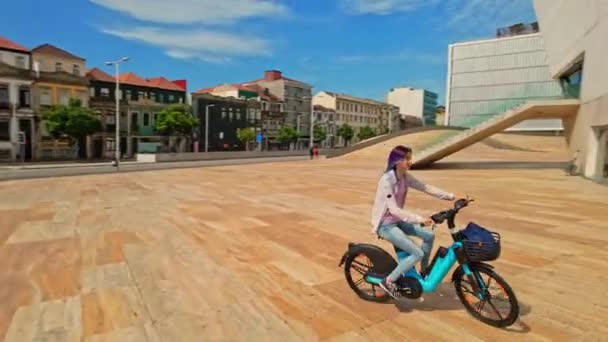 Woman Riding Rent Electric Bicycle Urban Style Green Energy City — Stockvideo