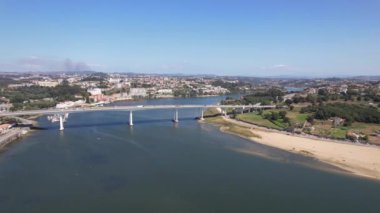 Aerial view of beautiful Freixo bridge ower River Douro in Porto city, Portugal. North region