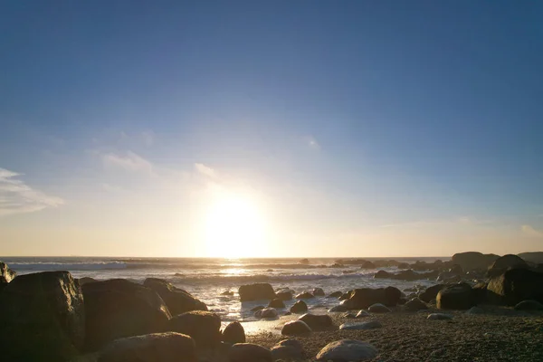 Atlantic ocean coast with the granite rocks on the sunset. rocky environment on the Northern Portugal coast