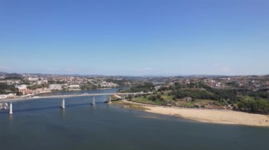 Aerial view of beautiful Freixo bridge ower River Douro in Porto city, Portugal. North region
