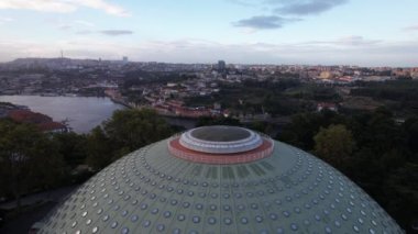 Aerial view, flying over The Crystal Palace near Douro river in the city center of Porto city. Portugal