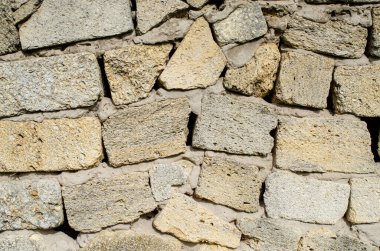 Modern tarz dekoratif desenli gri desenli düz olmayan taş duvar yüzeyi. Taş desenli arka plan.