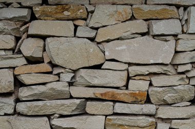 Modern tarz dekoratif desenli gri desenli düz olmayan taş duvar yüzeyi. Taş desenli arka plan.