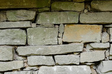 Modern tarz dekoratif desenli gri desenli düz olmayan taş duvar yüzeyi. Taş desenli arka plan.