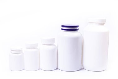 İlaçlar, ilaç şişesi, sağlık ve tıbbi destek. Vitamin hapları. Yeşil yapraklı vitaminler, doğal organik biyo takviyeler, fotokopi alanı.