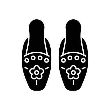 Geleneksel boncuk işlemeli siyah kabartma simgesi. Singapur boncuklu terlikler. Ulusal tasarım. Dekorasyon kıyafetleri. Peranakan nakışı. Beyaz uzayda siluet sembolü. Vektör izole illüstrasyonu