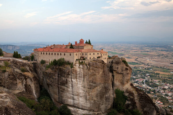 The rock monastery St. Stephen (Meteora) at sunset, Greece 