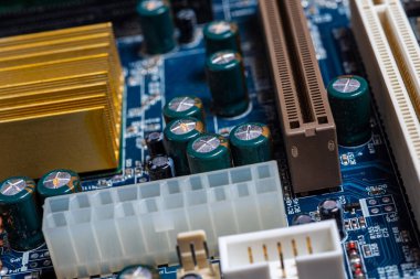 Computer electronic board with details, blue color, close-up