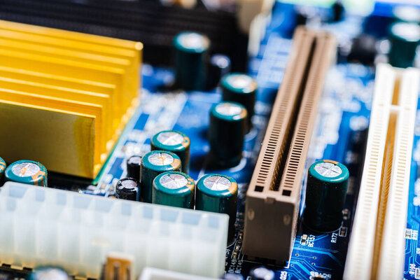 Computer motherboard, parts, attachment points and cooling radiator, close-up