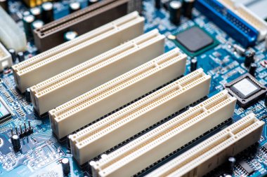 Mounts for memory on the motherboard of a computer, close-up, selective focus