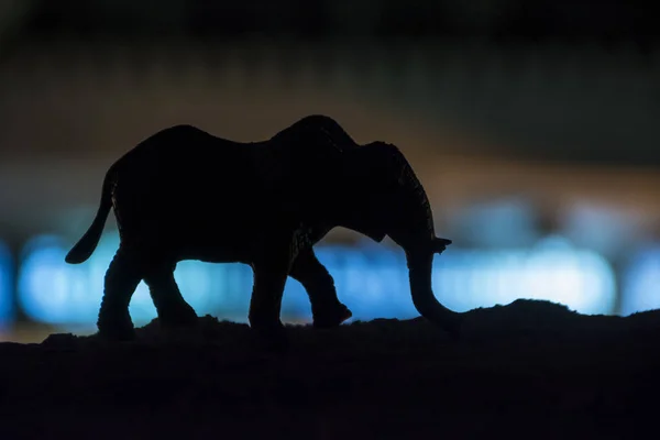Elephant silhouette, toy photography