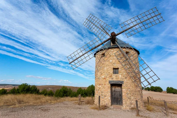 Stone mills with wooden blades to grind cereals. Buildings for agriculture. Landscapes of Castilla la Mancha in Spain.