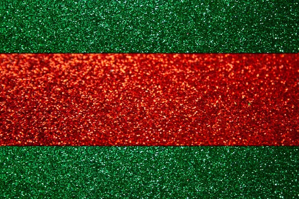 Glanzende abstracte groene achtergrond met rode strepen. Kerstmis glitter achtergrond — Stockfoto