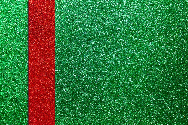 Glänsande abstrakt grön bakgrund med röda ränder. jul glitter bakgrund — Stockfoto