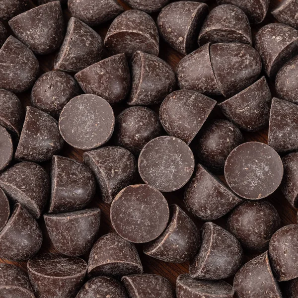 Nahaufnahme Draufsicht Auf Dunkle Schokoladenchips Nahrungsmittelkulisse — Stockfoto