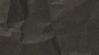 Kırışık siyah kağıtlar. Desenli arkaplan.