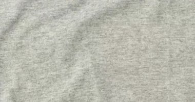 Gri tekstil kapanışı. Kumaş detayları arkaplan.