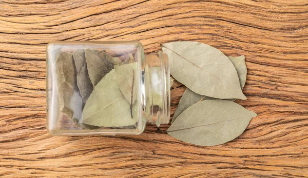 Dried Bay Leaves Glass Pot Wooden Table — ストック写真