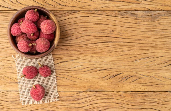 Lychees Bowl Wooden Table Copy Space — стоковое фото