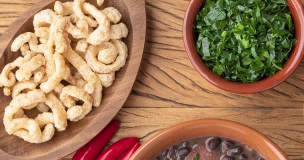 Typical Brazilian Feijoada Rice Kale Farofa Cracklings — Vídeos de Stock