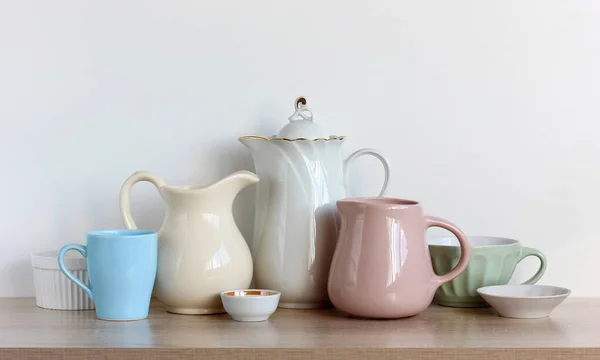 Empty jugs and other porcelain or ceramic dishes — стоковое фото